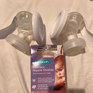 2 Advent Hand pumps. nipple shields New in box